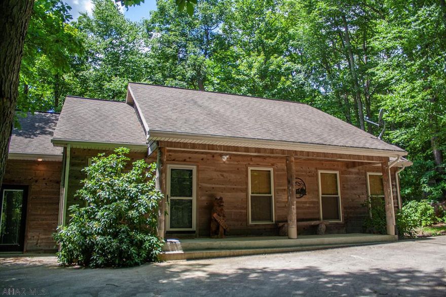 Incredible all season home nestled in a beautiful, private area. 3 bedrooms, 2 full baths, solid hardwood floors throughout, unique layout with a spacious loft and full bar that is greatfor entertaining. Covered patio out the back of the home with beautiful naturalwoodwork pillars. Seconds away from BlueKnob Resortthat offers a ton of activities including the ski resort, golf course, hiking trails, and four-wheeler trails. This charmingretreat is a perfect way to relax and entertain in an extraordinaryhome settled in the mountains. Extra lot bordering the home is also available to purchase.