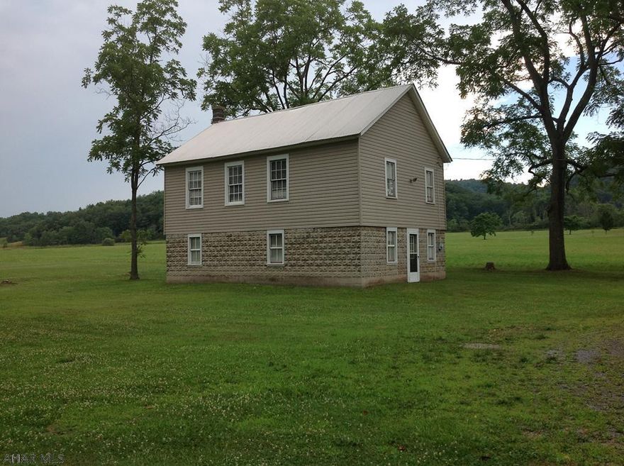 If you are looking for a beautiful building lot or a 1900's school house that has been raise and a room built same size under it. It would make a great family retreat or a hunting lodge very close to state game lands or a home. The setting is awesome and very quiet area.