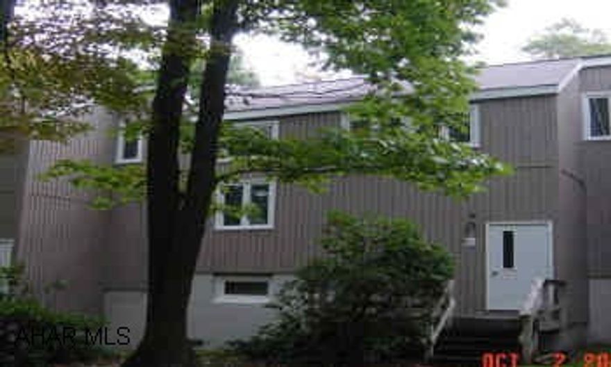 Located on golf course at Blue Knob Resort. 1BR condo. New refrigerator, carpet, sliding door, nicely decorated. Assoc. dues $334.40 per qtr.