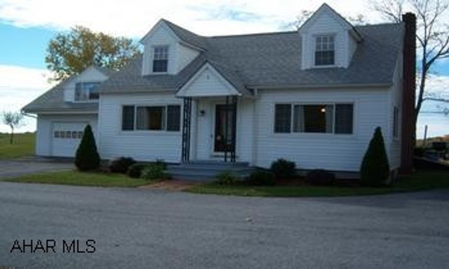 1 1/2 story well kept and up dated.  close to I 70 and Pa turnpike. also includes a 1 bedroom apartment and a two car garage. privacy fence, new windows, new roof and updated electric. all appliances included.