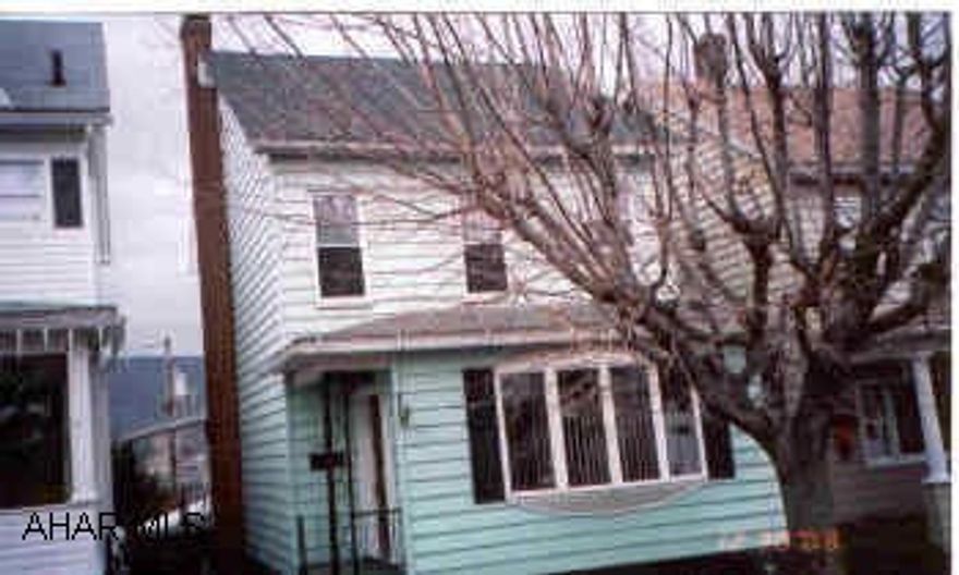 2.5 Story, 2 bedroom, 1.5 bath with heated attic.  Kitchen, dining and livingroom with full unfinished basement. House is move in condition.  Very clean.  Brand new roof, thermopane windows, hot water heat, 100 amp breakers, and a 2 car carport. $1,500 Back to buyer