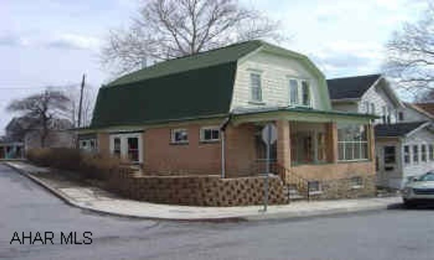 2 story, brick and frame. Just completely remodeled. New bath, kitchen, floor coverings and more. Nice oak woodwork in LR and foyer. Large kitchen. Full basement, newer GFA heat, good wiring and plumbing. Roof age unknown, insulation in walls and ceiling according to owner. Enclosed front porch. Many windows replaced in the home.