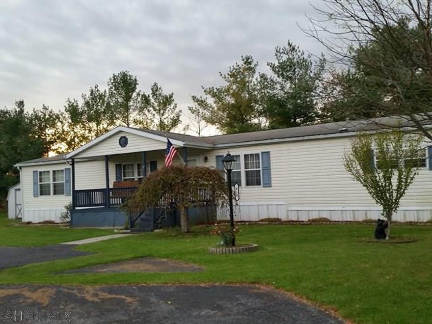 Spacious 72 x 28 Laurel doublewide w/family room w/fireplace, 3 bedrooms, 2 baths, walk-in closets, 2 porches, small fenced yard off back porch, ceramic tile in baths, French Doors to side deck. Lot Rent $381/mo includes trash & road plowing. Stove, refrigerator, dishwasher, wishing well & shed also included in sale. Must be approved by Manager to live at Independence Place, LP. Attached are 3 docs as received from Independence Place Manager on 11/27/17: The application, letter of instructions and copy of the rules & regulations.  J-409