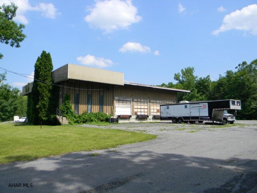 12-door cross dock truck terminal. Butler Steel building with 4,200 sq. ft. Large 10.275 acre lot w/room for future expansion. Close to all major roads including Interstate 99 and PA Turnpike Interchange. Great Location & Great Buy.