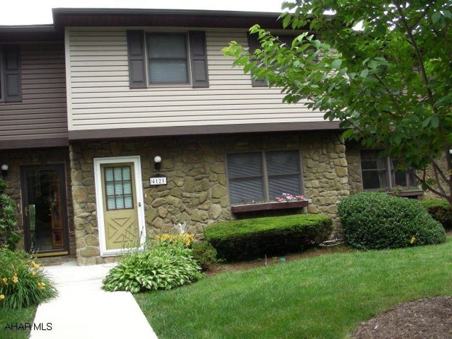 Immaculate townhouse in Highland Park.  Stone woodburning fireplace in living room, heated sunroom, new carpet in FR, beautiful oak staircase, eat-in kitchen with all appliances, formal DR with newer wood laminate flooring.  Radon system in place.  One car integral garage.