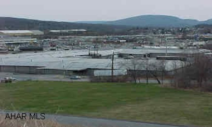 Manufacturing/Warehouse building. Few short term tenants. Approx 50,000 sq. ft. office space. Richard Johnston must accompany showing agent. 24 Hour Notice.  Located behind Value City Furniture.