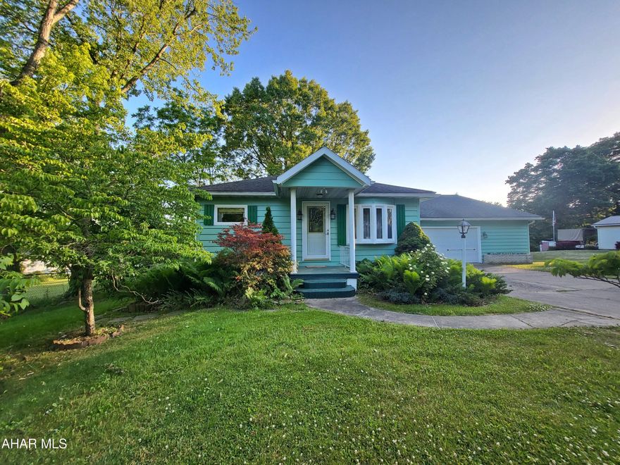 Charming one story in highly sought after Antis Township! 2 bedrooms, 1 bath with large living room, eat-in kitchen, 3-season breezeway and large covered back porch. Cedar siding, 2 car garage.