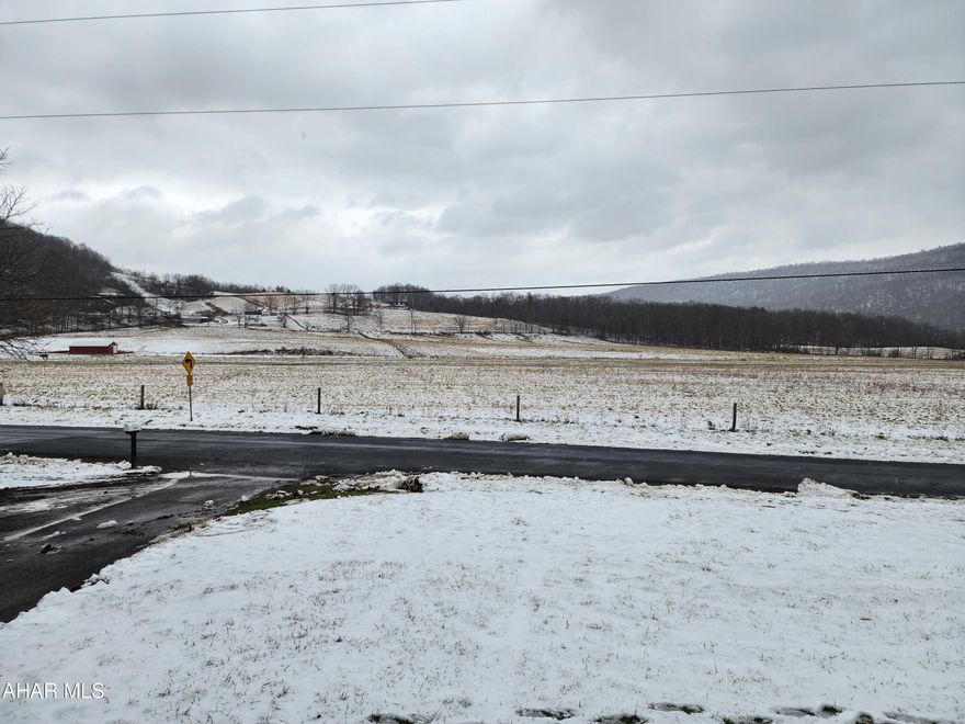 This charming 3 bedroom ranch located in Buffalo Mills just needs your personal touches.  Located on a quiet road in Buffalo Mills, the creek provides a melodic hideaway in the backyard.  Two detached garages offer lots of storage or parking space.