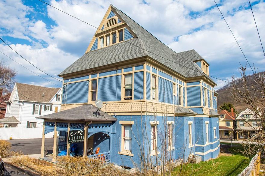 STUNNING!!! Beautiful 3 story building with basement. GORGEOUS woodwork and CHARMING character throughout. Main floor recently remodeled (Flooring restored to original surface, interior painting and remodeling done in 2016 & 2017, bathroom remodeled in 2016). Main floor is a great space for a business!!! 2nd Floor has an efficiency apartment (on its own electric. Heat and water with main building. Currently has a tenant paying $500/month) Other rooms on 2nd floor have potential for rental. Exterior recently painted in 2016. New HUGE parking lot/driveway installed in 2017. Extensive landscaping done in 2016 & 2017. Building also has the potential to be a great home! Current owner, Manning Photography, has outgrown this building and is in the process of constructing a new studio.