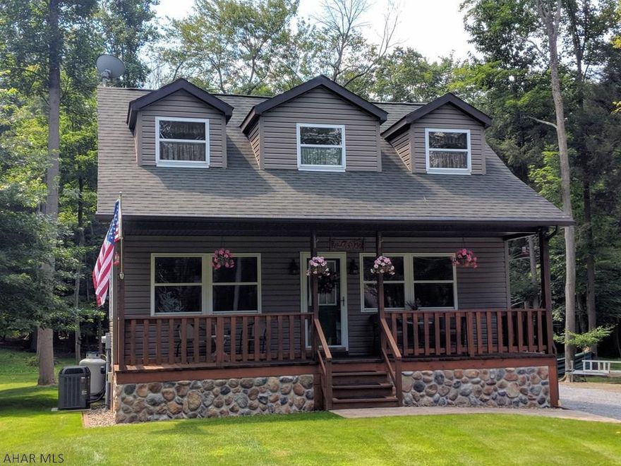 9/7/18  Looking for a small homestead or cozy getaway?  Then you must see this 2+ bedroom, 1  bath cabin in the woods!  Cabin has a beautiful stone gas fireplace, whole house water purifier and detached two car garage, large deck, vinyl & stone facade. It's situated in a gated community which provides a pool, ballpark, tennis courts, playgrounds, clubhouse, basketball court, picnic pavilions and allows the use of ATV's and golf carts.  The gated community is a half mile from Prince Gallitizin State Park, home of a beautiful nine mile sailing and fishing lake, several marinas, picnic areas, boat launches and many hiking trails.  It is adjacent to over 20,000 acres of State game land & 10 minutes from Rock Run ATV Park, offering 140 miles of trails for ATV's, dirt bikes & more! A must see!