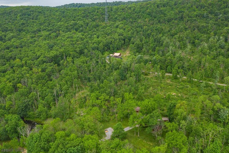 Nice 5 Acre Lot with well and septic and electric already present. Build your dream home.