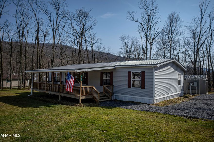 Well maintained 4 bedroom 2 bath doublewide in the Claysburg-Kimmell school district. Open concept kitchen and living room. Spacious Master bed  with walk in closet and bath. Large covered deck. Schedule a tour.