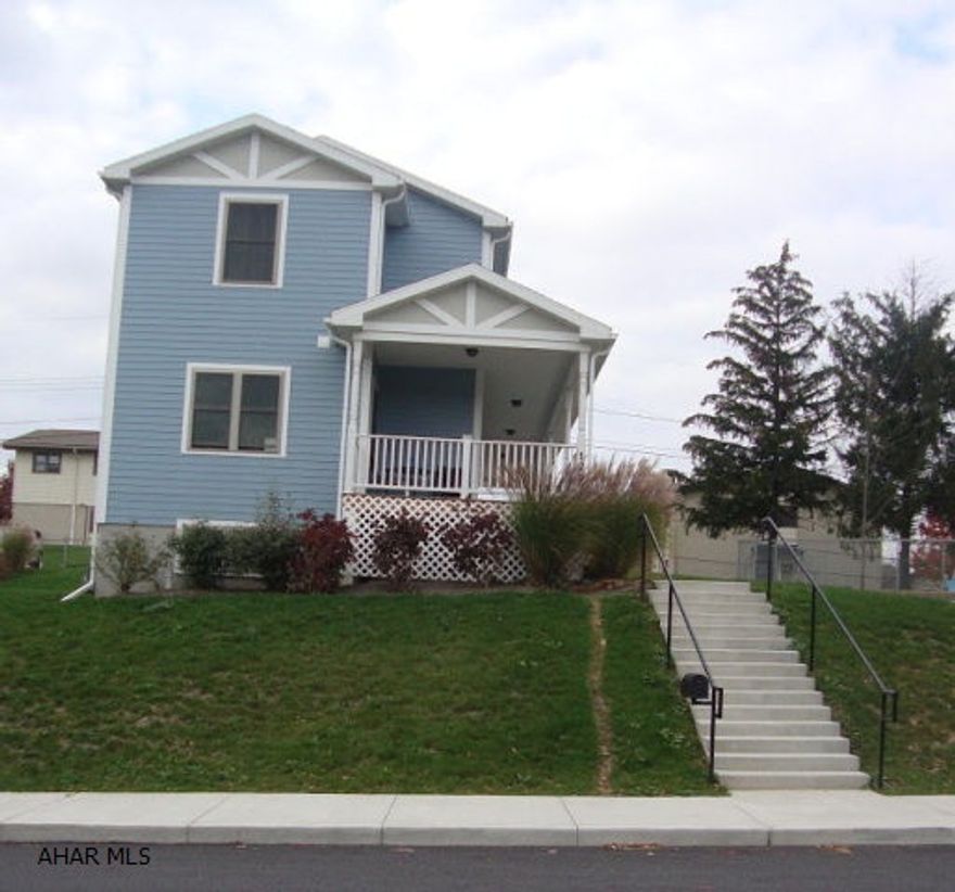 Great opportunity within the city. This energy-efficient newer construction has all the features a growing family requires. This 4+ bedroom features 2 baths, first floor master bedroom and beautiful panoramic views from the wrap around porch. All appliances included. Second floor laundry room with built in shelves. Plenty of storage with walk-in closets. Large partially finished basement with space for in-law suite; currently set up with an office, family room, and workshop. Family- friendly neighborhood one block from McAuliffe Heights Elementary School. Concrete off street parking. Check out this beautiful 2 story home!