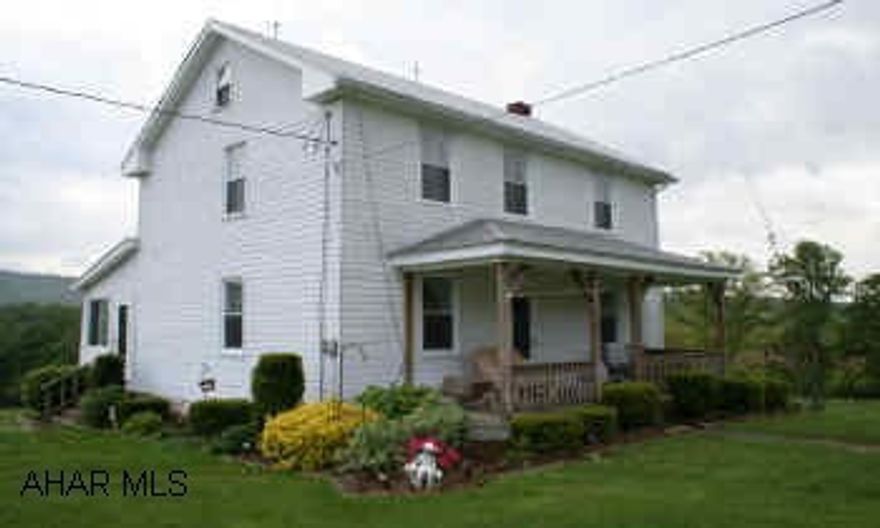 Farmhouse w/wounderful views. Large living room, country kitchen w/dining area, pleasant sunroom w/views of the mountains, 4BR/1BA. Ideal location, just miles from Raystown Lake! New furnace 3/06, covered front porch with vinyl ceiling. Window screens. 2-story bank barn, free stall barn w/50 stalls and bunk feeder, 14'x15' fickes cement silo w/unloader, ceramic tile milkhouse, frame machine shed w/steel roof, pig pen.