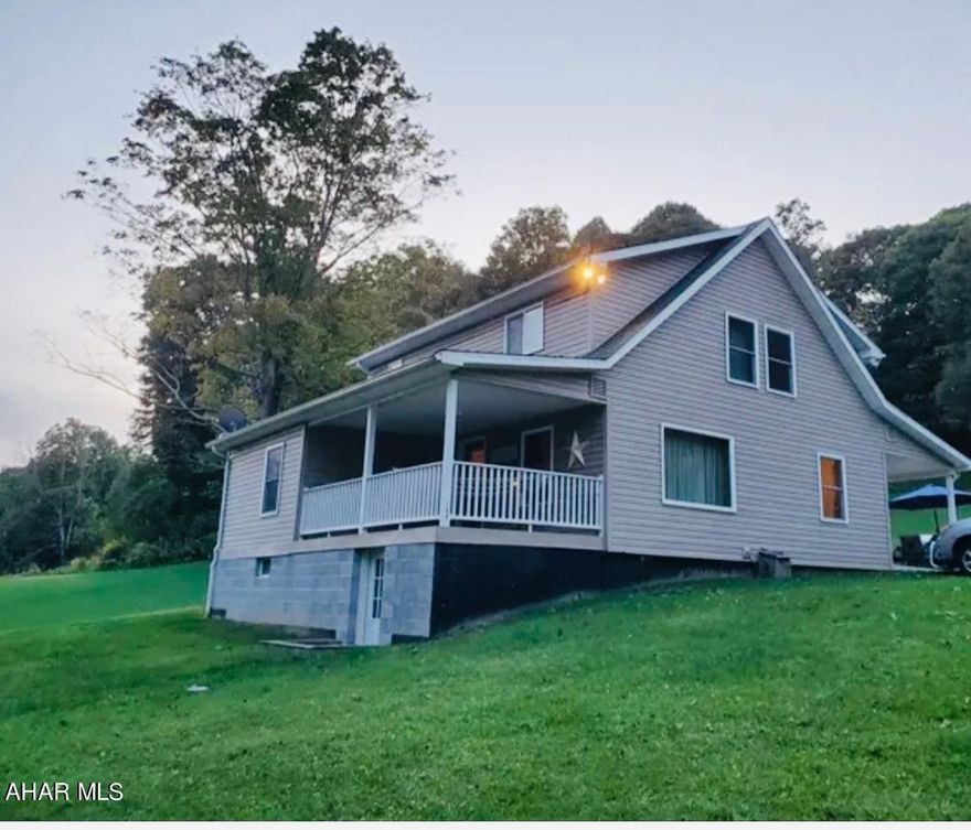 Country living at its finest with this beautifully adorned home on 5.4 acres. This residence features a lovely first floor open concept with an updated kitchen/dining area and newer flooring throughout.  First floor office is great for working at home!  Directly off the kitchen you will find a  laundry room for convience. This home features 3 bedrooms and two and a half baths. Plenty of space for entertaining with covered front porch and backyard covered patio with retaining wall. Priced to sell call today! This property has exceptional views from all rooms! Relax and enjoy all the
awesome features this home offers. Large detached barn for all your outdoor equipment!