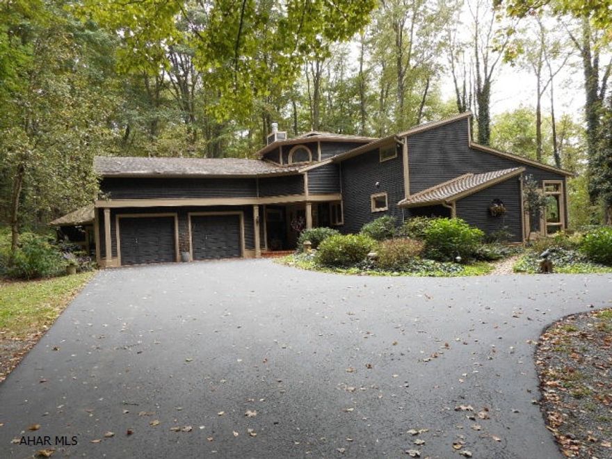 4 BEDROOM 2 BATH 2 STORY HOME IN COUNTRY SETTING ON 11.69 ACRES. NEXT TO IRON MASTER COUNTRY CLUB. YOU CAN EVEN PLAY TENNIS ON YOUR OWN COURT.  CLOSE TO SHOPPING AND SCHOOL AND ONLY 4 MILES FROM I-99 AND THE BLAIR COUNTY AIRPORT.  WATCH THE DEER AND BEAR FROM YOUR BACKYARD.