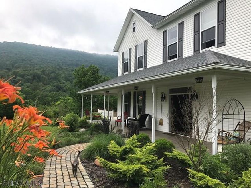 If you are looking for a beautifully renovated farm house on 5+/-acres in a peaceful and tranquil setting and a large 3 car garage, then look no further. You will fall in love with this setting! From the moment you enter this home, it is obvious the homeowners spared no expense in creating an oasis that allows outdoor space to blend naturally with the incredible designer inspired interior. Architectural features like the wrap around covered porch, gorgeous crown moldings, large updated windows and the fabulous outdoor fireplace will captivate the most discriminating buyer. Three master suites with lovely private bathrooms and an impressive kitchen surrounded by terraces and lovely landscaping.