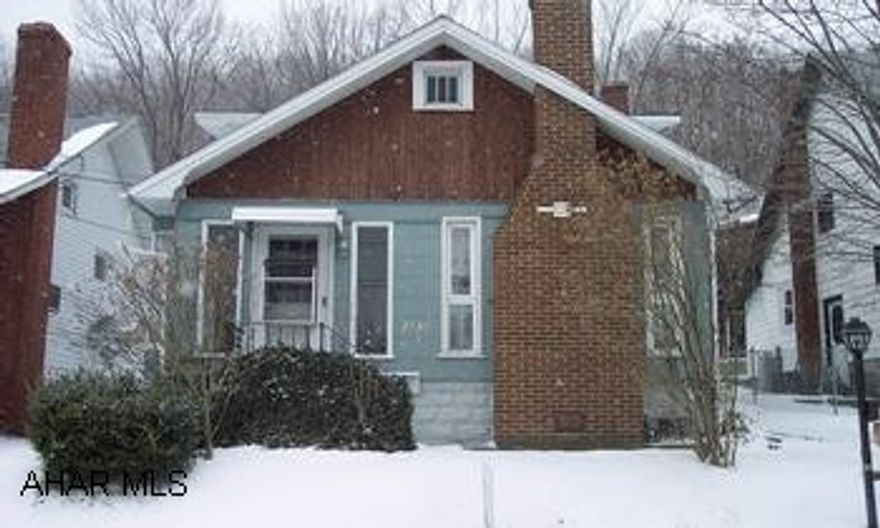 Great starter home! 1st fl. BR & BA, large eat-in kitchen, wood burning FP, updated triple pane windows. 2 upstairs BR's need work (owner to take care of). New water main replaced in winter 05/06. Great starter home! 1st floor bedroom and bath, large eat-in kitchen, wood burning fireplace, and updated triple pane windows. 2 upstairs bedrooms need work (home owner is taking care of). New water main replaced in winter of 05/06.