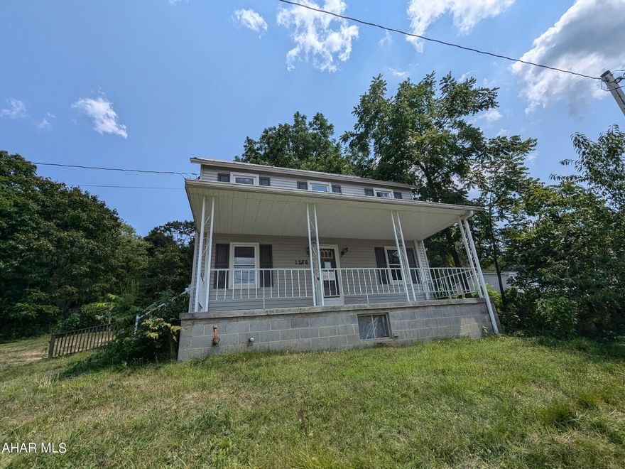 Imler area 2 story home on nearly 1 acre level lot! Features large formal living room, formal dining room and full bath on first floor w/ laundry hook-ups. 3 bedrooms upstairs with walk-up attic for storage, large covered concrete front porch and side porch w/ patio for entertaining and relaxing summer days. 2 large storage sheds and off-street parking. AS-IS sale, seller will make no repairs.