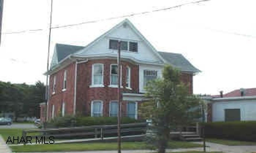 Certain parties excluded.  Three bedroom apartment included on second floor.  Leased until 5/31/03; $1,450 per month first floor, $280 per month second floor.