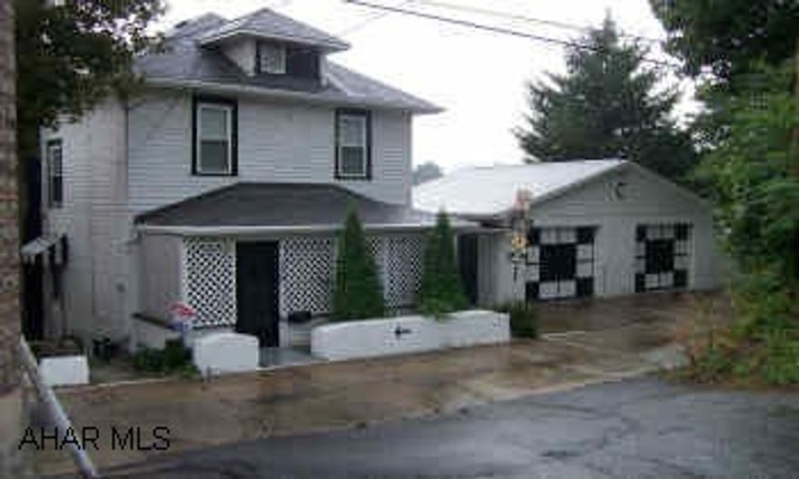 Absolutely adorable 2-story, 2 bedroom home.  Very private lot - 2 car garage Home has newer roof, furnace, windows, garage, carpets and much more.  Terrific home!  Low utilities!  Great Buy!