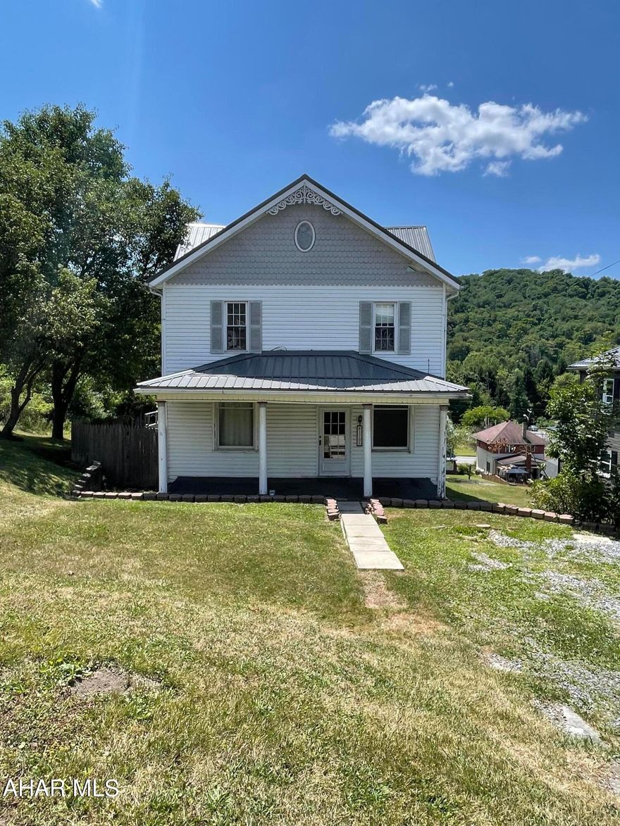 This large 4 bedroom 1.5 bath home in Northern Cambria Borough has some original features such as pocket doors that give it character and also several updates like first floor laundry and a half bath giving it a more modern feel.  The spacious kitchen has plenty of cabinets for storing all of your gadgets.  First floor has an entry room, living room dining room half bath laundry and kitchen.  The second floor offers 4 nicely sized bedrooms and a full bath. The walk up attic could be finished for additional living space.  Grill out on your rear deck and enjoy the Mountain View in the fall.  There is off street parking and a shed for your outdoor tools!  Call today for any additional information.