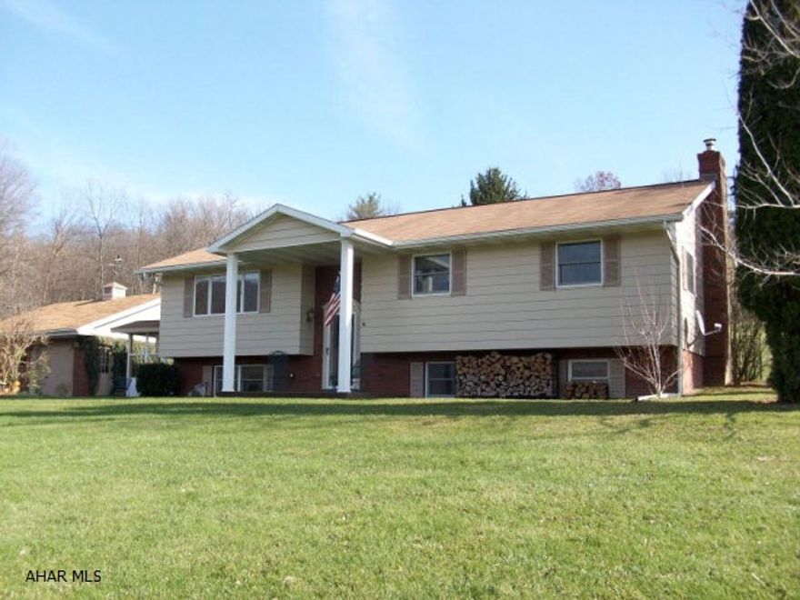 Stunning views of Scotch Valley and Brush Mountain that you simply cannot put a price on.  Outside, enjoy the large lot that borders state game lands and the koi pond from the attached patio (screened in w/ storm windows).  Inside, take in the breathtaking views through the bay window from the wide-open main floor.  This house is decked-out with hardwood floors and cabinets, stainless appliances, central air, and recently remodeled bathrooms.  Owner uses only 200 gal of oil per year to heat, and taxes are very reasonable for what you get.  Location qualifies it for rural loans.  Central vac, security system, 24x28 garage.