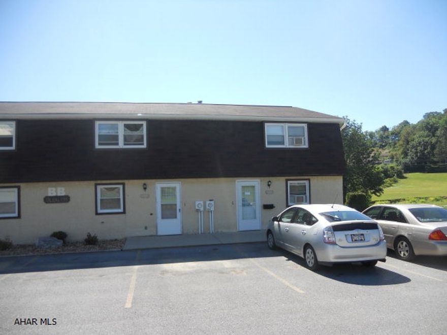 This is a perfect opportunity to buy a beautiful, spacious 2 bedroom, 1.5 bath townhome in a nice and quiet community within Duncansville. It has an amazing view of the woods surrounding the townhouse and a stream right in the backyard. It is located in a well-maintained private community but is still close to stores & shopping. Located in Hollidaysburg school district. The HOA fee includes the following: access to the in-ground swimming pool,lawn care, snow removal, trash removal, exterior building updates (roof & siding).