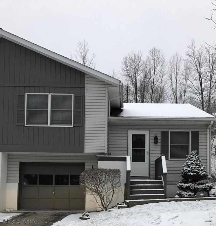 Come see this well maintained 2 bedroom town house in a great neighborhood with a 1 car garage, electric baseboard heat with storage heat and a shed in the backyard. Taxes will be reduced in 2017. Entertain in the finished family room on lower lever or on the deck --and enjoy the fresh air at the top of Timberline.