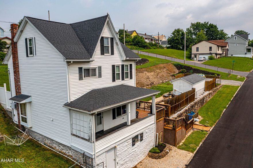 If you were looking for a HUGE lot with plenty of outdoor entertaining space in a convenient location in Altoona - look no further!! This well maintained 3 bedroom home sits on a HUGE lot with plenty of room for entertaining your guests, your family, and your pets! This home boasts 3 large bedrooms, 1 full bathroom, and 1 half bathroom - plenty of room for your family. The kitchen features two huge pantries and has a view to the living room and an attached dining room with a natural gas fireplace to keep you cozy in the fall and winter months. The laundry is conveniently located on the first floor and the lights turn on automatically as you enter the laundry room! The 3 bedrooms are very spacious, one of them being a primary bedroom with space for a nursery, office or workout area within the room. One of the other bedrooms is the entire attic which is another huge room that could be used as a primary bedroom, playroom, or extra entertaining space, the possibilities of this home are endless! The best part of this home is the space to entertain outside on the patio, in the nice flat yard or in the huge upper bonus yard where the pool has a beautiful view of the mountains and can view fireworks during the 4th of July. There are two large storage sheds and both have electric and lighting. The pool and deck area will make you feel on top of the world!! Don't miss out - schedule your showing today!