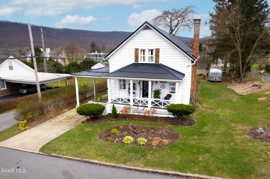 Step into your own country cottage with the luxury of living minutes away (walking distance) from Downtown. This charming Cape Cod situated on Watson Street is located in the Bedford Borough and has privacy and charm! This parcel lot is at the end of a quiet street and provides plenty of parking. A concrete drive and large, attached car port to the home gives protection from the weather while also having covered stair access to the basement. The front porch is inviting and ready for you and your cup of coffee or tea to catch the morning sunrise.
Original oak floors throughout the main floor are in excellent shape! A brick, wood burning fireplace in the living room has a new damper and has been properly fixed and maintained, and provides warmth on these chilly evenings!
Two bedrooms and a full bath along with the kitchen, dining, and living room areas give this home a spectacular advantage if one floor living is desired. Both first floor bedrooms with closets, oak floors, ceiling fans and radiator heat. Full bath has a beautiful wood barn door with wood accent in the hall way and white washed pine wood walls and ceiling. Includes a porcelain tub with shower, linen closet and radiator heat.
All stainless steel kitchen appliances included in this updated and modern kitchen with butcher block countertops. Room was made for a brand new dishwasher from S&S Appliances. Locally bought and locally serviced! There's a large kitchen sink and country cottage windows for light, and cupboards that reach the ceiling give you more storage than you can imagine! Exit the kitchen onto the cozy covered back porch for quiet time to read or watch your animals or kids play in the yard.
Second floor provides original pine floors for the bonus area that gives you a loft feel. This room has baseboard hot water heat, plenty of storage and can be a den, playroom, or even extra bedroom. The master suite with baseboard hot water heat, is located on the second floor with a grand sitting area and long closet. White washed pine walls, wood beams, light and dark wood floor, and barn doors give you the log cabin feel in a modern home. A large master bathroom suite is complete with glass bowl double sinks, tub and shower, radiator heat and room for linens. This home also includes a 2021 Shawnee Structure custom built shed. Leaf Filter gutters with a conveying lifetime warranty give you the assurance of never needing to worry about cleaning your gutters! A large outdoor fire pit for outside enjoyment and entertaining beside a big, beautiful weeping Cherry that is full of life.  The basement has been re grouted and resealed with dry lock paint that keeps the moisture out! New utility sink, washer/dryer hook ups, 200 amp, two oil tanks and a fully cleaned, restored and working furnace round out this home that needs to be yours!