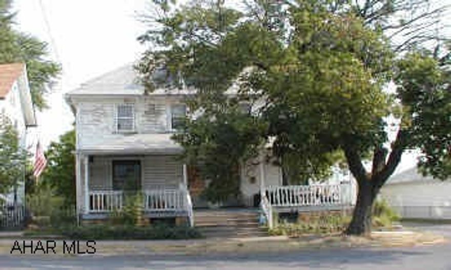 Double house in nice residential neighborhood.  3 bedrooms each side.