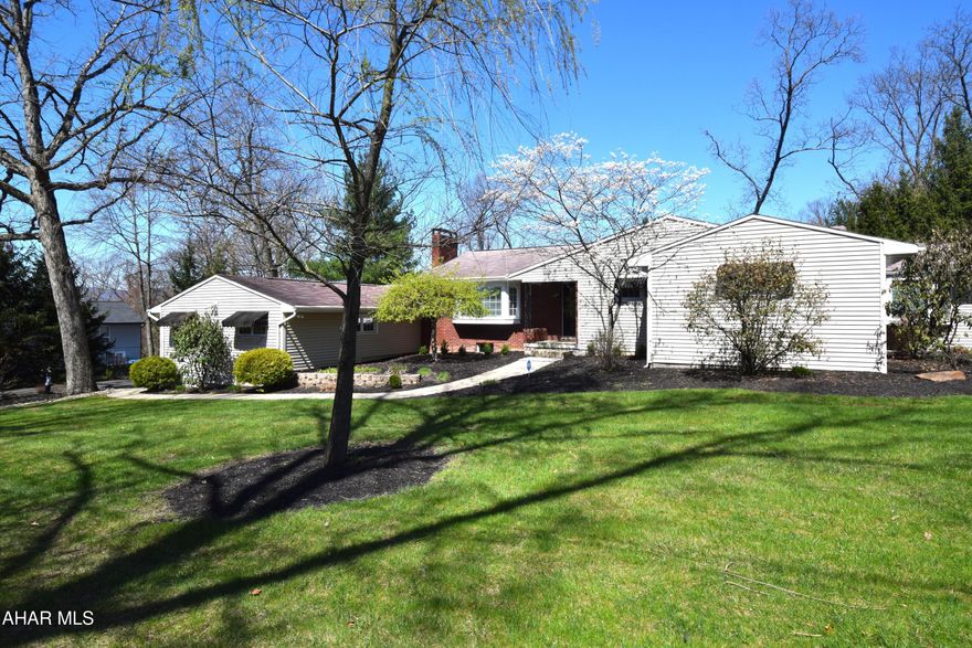 Absolutely beautifully remodeled home tucked into a private lot off Sylvan Drive.   The incredible setting for this home is just the beginning.   Upon entering you will find tasteful,  custom, decorator colors that create an instant cozy feeling the minute you walk in the door.  The kitchen features a center island with pendant lighting, granite countertops, gas range, prep sink,  built in microwave and plenty of seating.   Take your morning coffee out to the  cute sunroom off the kitchen.  The open floor plan encompasses the kitchen, dining area, living room with fireplace and step down den with half bath.    The primary bedroom suite features a ''knock your socks off''  bathroom with soaking tub, walk in shower,  water closet, and double sinks.   Three additional bedrooms and hall bath complete this level.   The basement is full and nicely finished with 3/4 bath.  The outdoor living area includes a covered  paver patio, outdoor kitchen, heated in-ground pool, and fire pit.   Additional outdoor space is perfect for basketball hoop,  hockey practice, or whatever other activity you can come up with.  Don't miss out on this perfect property.