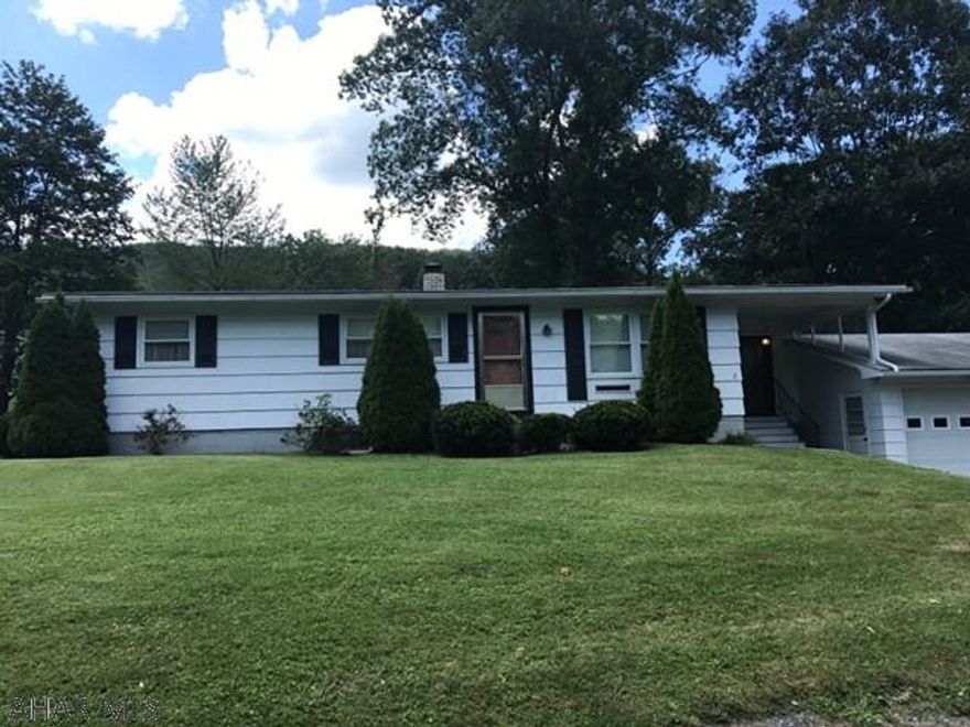 Lovely 3 bedroom, 1.5 bath ranch on a large lot in the Foor Addition. Hardwood floors, finished basement with a large kitchen, woodstove, extra bedroom and full bath. Great yard and an attached 2 car heated garage.