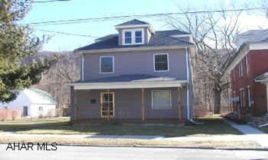 Remodeled 2 1/2 story home with new roof.  Large modern oak kitchen. Wrap around deck. 2 car detached garage, separate carport.  Remodeled 2 1/2 story home with new roof.  Large modern oak kitchen. Wrap around deck. 2 car detached garage, separate carport.