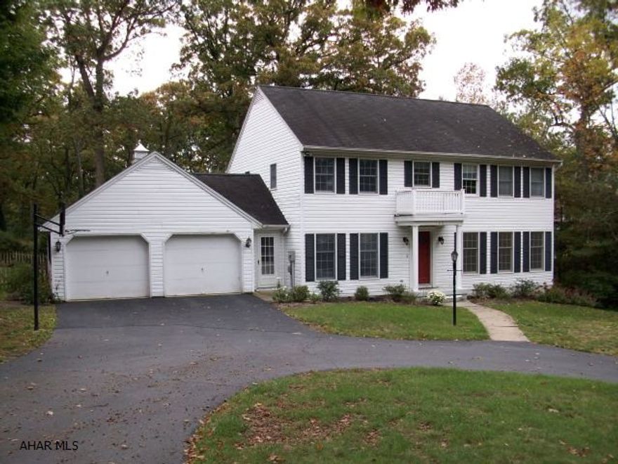 Have it all without paying alot with this roomy 2 story home: convenient location with a large, private back yard.  Inside you'll find amenities you normally pay much more for: ceramic tile, main floor laundry, fireplace, and finished basement.  Extras include a screened-in back deck, breakfast nook in the kitchen, master bedroom dressing area, and tons of storage.