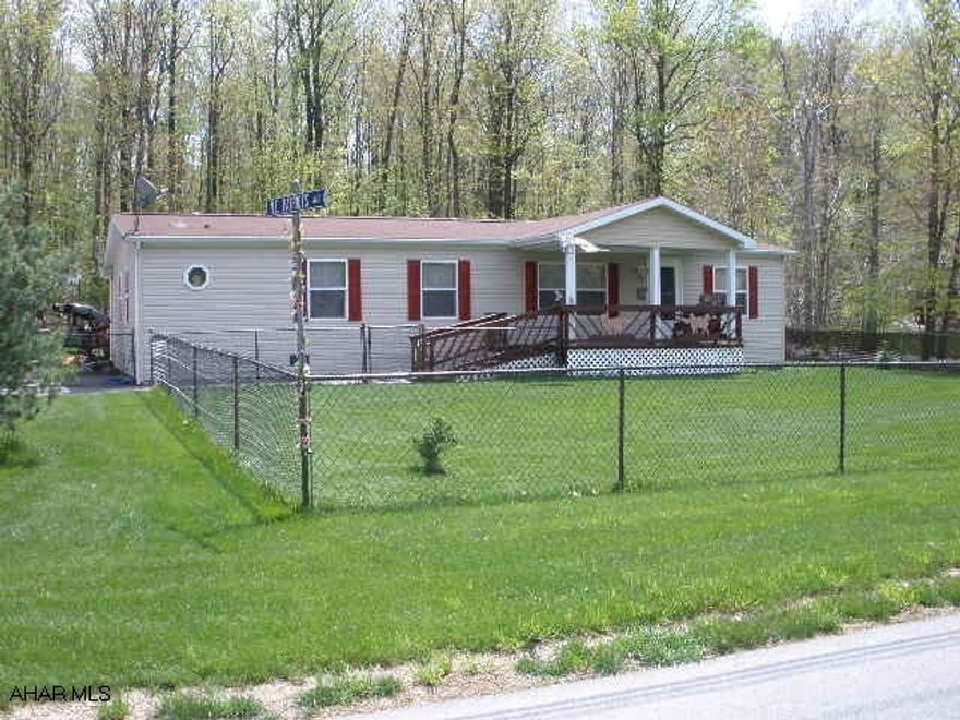 Move in ready Doublewide on full foundation.  Mint condition, fenced in yard and detached garage on a large, level lot.  Must see!!