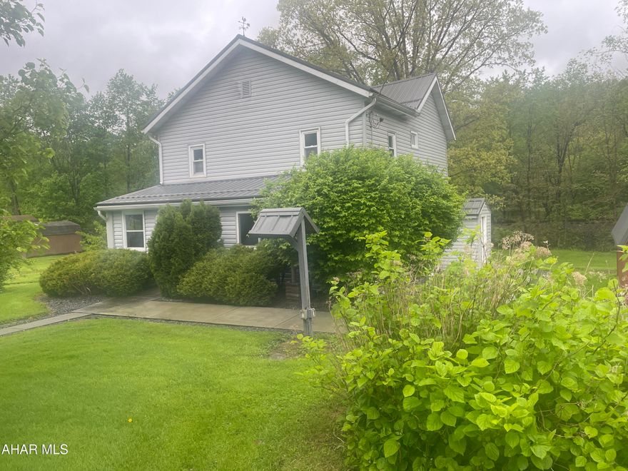 Lock box front door. Use exterior basement entry for basement access.
The sewage is disposed of via a Wildcat system. This is typical in Dysart. The line exits throught the rear yard, angles right at the RR tracks and emptys in an area with a storm water ditch then goes through a pipe under the RR tracks. The water system is a public/community system with lines to each home. $30/month. Bedroom #2 has a captive entry.