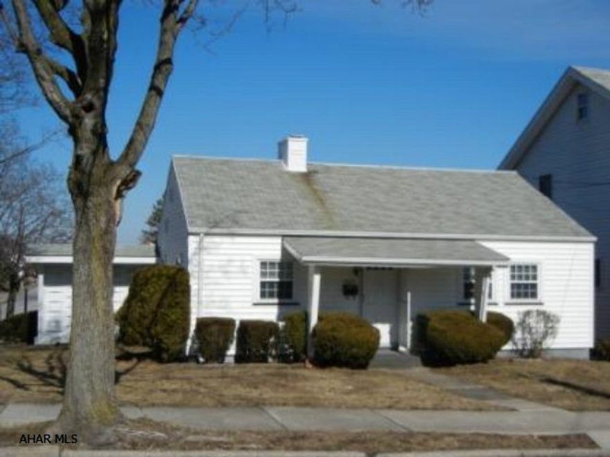 one Story 2 Bedrooms and 1.5 baths includes family room with fireplace covered carport nice lot.