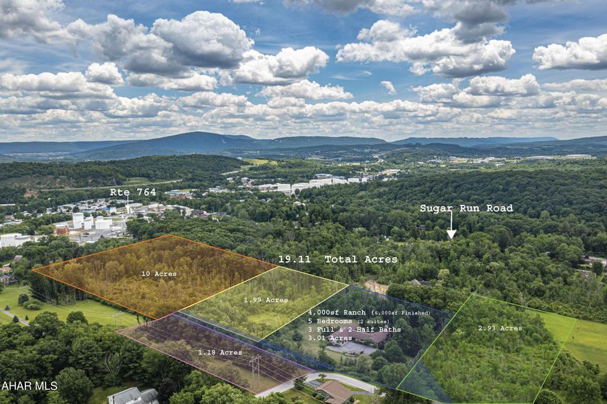 Reference Yellow plot # 2  in the pictures Part of a larger 19.11 acre grouping of contiguous parcels including a large Ranch Home all of which are being listed in 5 separate listings and all are located in Hollidaysburg Area School District 10 acre land 1.99 acre land 1.18 acre land 2.93 acre Land 3.01 acre Ranch House Total possible acres 19.11
