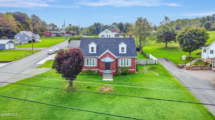 Listed below recent appraised value! Welcome to 107 Beechwood Drive in the Central Cambria School Districts! Situated on a spacious corner lot, it has undergone a full remodel, ensuring a modern & comfortable living experience. The property boasts numerous upgrades, including a new roof, kitchen, bathroom, refurbished hardwood floors, drywall, paint, flooring, & lighting - just to name a few. As you step inside, you'll be greeted by a welcoming foyer with closets on both sides. The first floor features a generously sized living area, flooded with natural light, & a fully remodeled kitchen that has been transformed from top to bottom. There's also a dining area, a beautifully updated full bath, a large sunroom, & two spacious bedrooms. Venturing upstairs, you'll find two additional roomy bedrooms that offer ample space for your family's needs. The basement is currently unfinished, but it holds great potential and houses your laundry facilities & an additional commode. Outside, the property boasts a private fenced-in yard, perfect for enjoying outdoor activities, & a large detached garage with finished space. Ample off-street parking is available as well. Don't miss your chance to see this exceptional home in person! Call today to schedule your private tour & experience the charm of 107 Beechwood Drive.