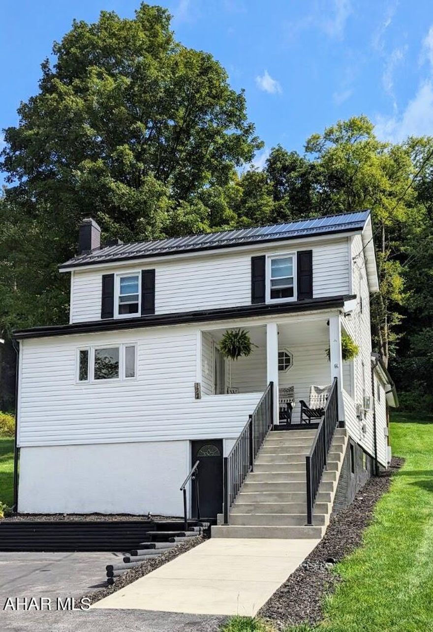 Enjoy over 8 acres of property from the stunningly finished back-patio at 172 Bradley Street. Imagine sipping a drink from this modern oasis in the shade while a breeze blows through... Plus this 3 bedroom home is move-in ready! Shed, garage, and plenty of parking here. Updated, stylish exterior and interior make this home in Elmora a rare find. Cambria Heights SD.