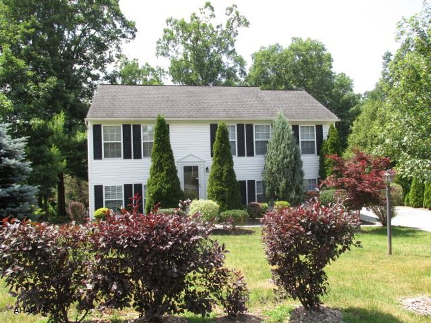 S & A Built. 4 Bedroom, 2 bath home located in a cul-de-sac development next to State Game Lands. Finished basement can be used as a bedroom or family room, 2 car garage, security system, hardwood floors, wooded setting.