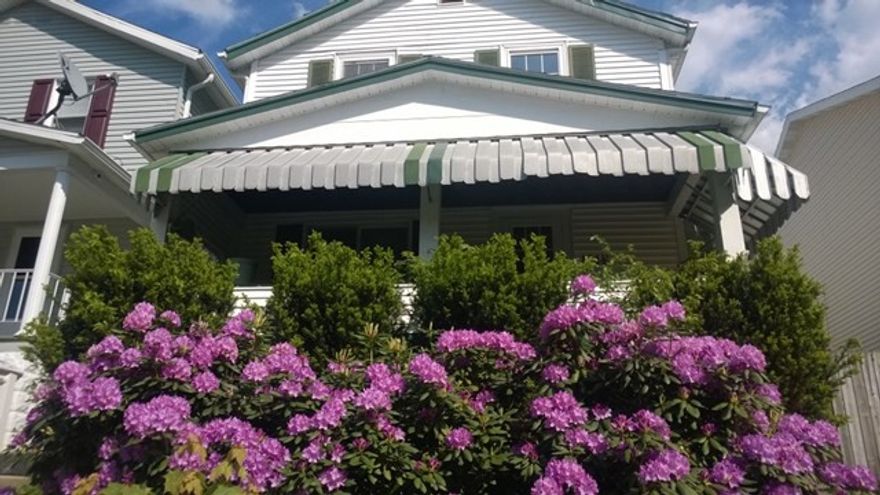 Near campus. New kitchen and bathroom.  Just carpeted. Really big family room. Oversized master bedroom. 2 car garage.  Covered front porch and side entrance covered.    Ready to be occupied.  Basement plumbed for bath and laundry. OVER SIZED FLOOR PLAN - undersized price.