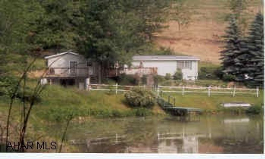 4 BR, 3 Bath home on 70 Wooded and open acres, 3/4 acre stocked pond, great for horses, very private, must see.....