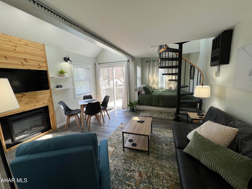 Beautifully renovated loft in the Allegheny Mountains at Blue Knob All Seasons Resort has everything you need. Remodeled and fully furnished. New kitchen cabinets countertops, windows, sliding door, flooring, fireplace, stainless appliances and so much more. Breathtaking stone fireplace and Wood accents make this condo a wonderful place to be anytime of the year. Walking distance to indoor pool/hot tub, outdoor pool and The Club House Bar & Grille. Blue Knob is the 2nd highest mountain and highest skiable mountain in Pennsylvania! In addition to an array of winter activities, Blue Knob also has a full-service all seasons Conference Center for weddings and events, they also offer golf, swimming and multitude of trails for hiking, running, and mountain biking. Visit https://blueknob.com/activities-events/ to see all the fun events that are happening at Blue Knob. $290.00/ Mo HOA fee includes: pools, hot tub and gym area, tennis and pickle ball courts, building, property maintenance & garbage. *Additional fees apply for conference center, Golf and Skiing