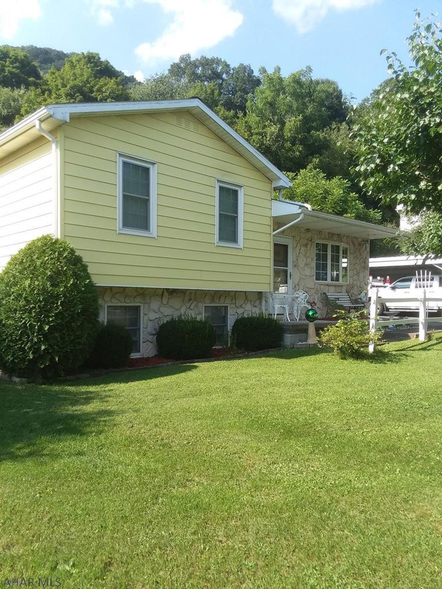 This well maintained bi-level home is a must see! Some features are 2 bedroom, eat in kitchen, living room, family room, sunroom, 1st floor laundry, new bathroom, gazebo, attached and detached garage, carport, black top driveway, 200 amp breakers, woods all this sits on .85 of an acre. Listed for $139,900, call agent for a showing.