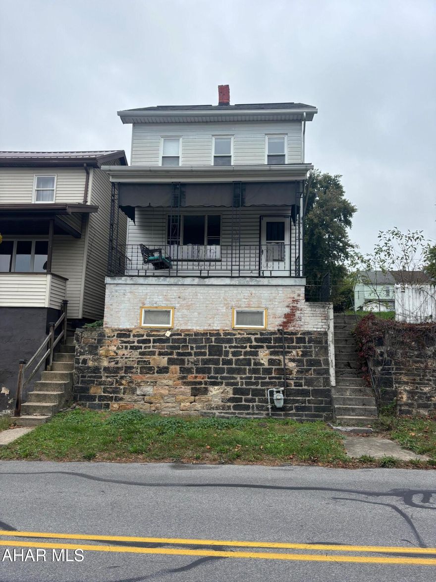 A nice 3 bedroom, 1 bathroom home. Oven included in the kitchen as well as a dryer located in the basement. All appliances are as is, including window units. This home also features a nice front porch with a swing included! Parking located on the back of the house, and lot beside property is also included. Come check it out!