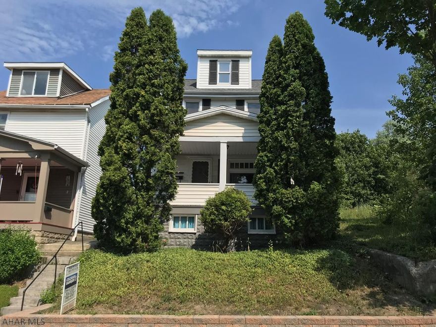 Spacious family home with first floor laundry room, large kitchen with appliances and lots of cabinets, replacement windows, new GFA Carrier furnace in 2017, new shingle roof in 2018, patio in rear with new retaining wall, new cement sidewalk in front.  Third floor is finished for 4th bedroom.  New carpet in living room and dining room.  Move in and put your personal touches on this great family home.