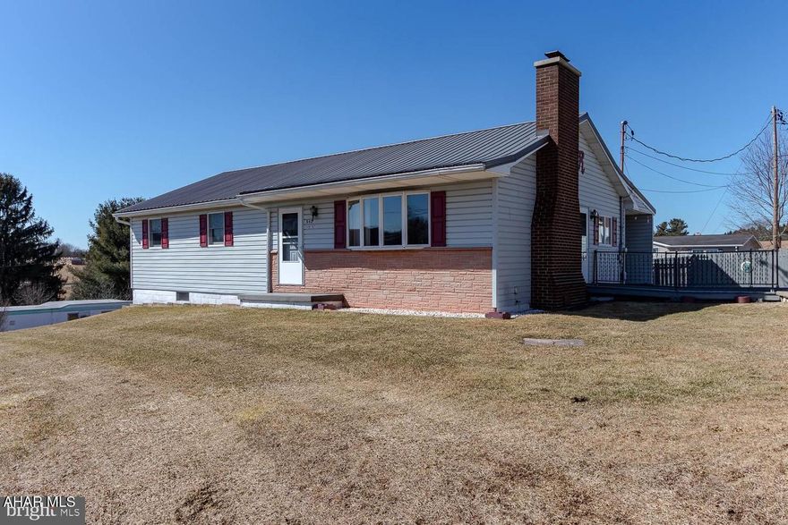 Welcome home! This spacious 4-bedroom, 2-bath ranch is the perfect place for your growing family. The main floor offers four comfortable bedrooms and a full bath, along with a bright and inviting living room featuring a charming fireplace. The large kitchen boasts an abundance of cabinet and counter space, plus an eat-in area ideal for gathering family and friends. A sliding door off the dining area leads to a cozy covered back porch, perfect for relaxing and enjoying the outdoors. Downstairs, the newly remodeled basement provides a fantastic rec area, complete with a warm and inviting wood-burning stove and a convenient second full bath. Whether you're looking for a place to unwind or set up a game room, this space offers endless possibilities! You'll also find a large storage area and dedicated laundry space for added convenience. Outside, the level backyard is perfect for play, pets, or summer barbecues, while the 2-car garage offers ample parking and storage. Don't miss your chance to make this home yours! Move quickly, and let's get you settled in time to enjoy summer in your new home!